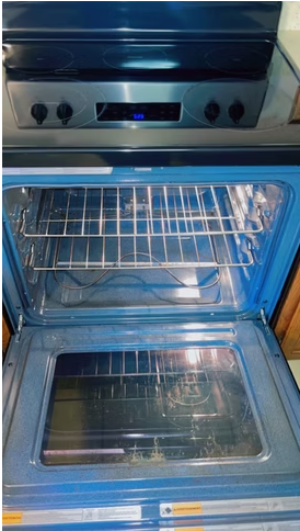 Clean oven interior with racks after a deep cleaning